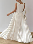 FJØRNA white A-line maxi dress with loose pleats, V-neck, and solid color design, perfect for elegant summer occasions.