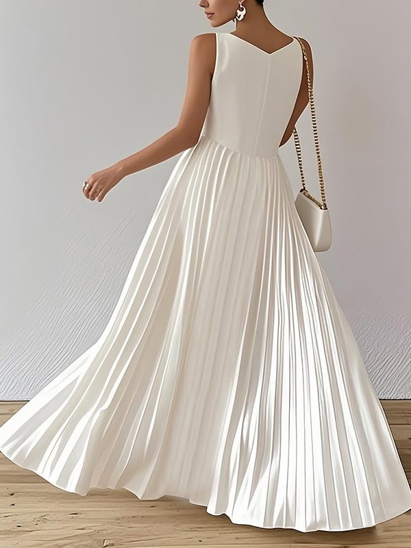 FJØRNA white A-line maxi dress with loose pleats, V-neck, and solid color design, perfect for elegant summer occasions.