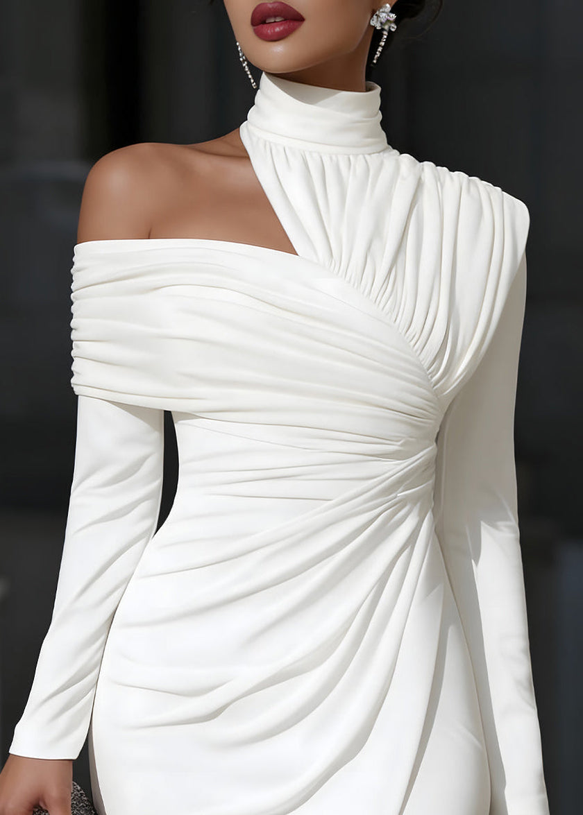 White Ceylan Women’s asymmetric midi dress with draped one-shoulder design by FJØRNA, shown on a model with a flowing silhouette.