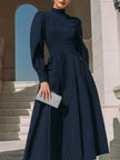 FJØRNA high-neck pinstripe midi dress for women with structured waist and classic style, shown in a full-length view.