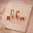 Unisex piercing set by FJØRNA featuring multiple small earrings and accessories for women, displayed on a white background.