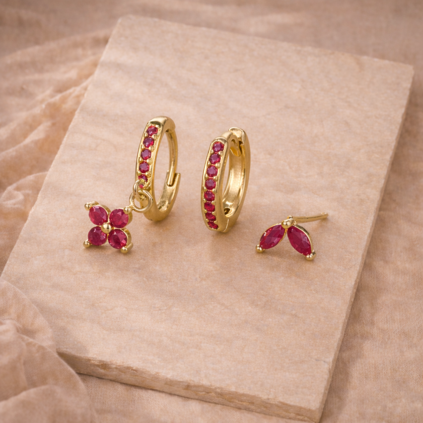 Unisex piercing set by FJØRNA featuring multiple small earrings and accessories for women, displayed on a white background.