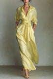 FJØRNA solid color lapel long sleeve maxi dress with casual pocket and waist-cinching design, perfect for everyday wear.