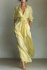 FJØRNA solid color lapel long sleeve maxi dress with casual pocket and waist-cinching design, perfect for everyday wear.