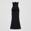 FJØRNA women's strapless maxi dress with corset bodice, flowy fabric, and elegant design, perfect for formal occasions.