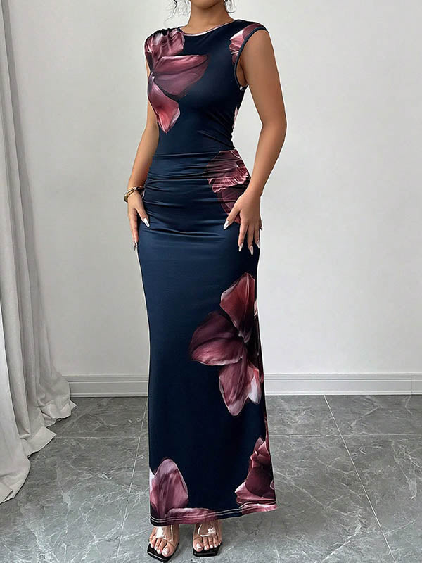 FJØRNA sleeveless white maxi dress with contrast color flower print, round neckline, bodycon fit, perfect for summer occasions.