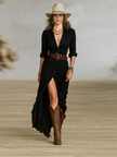 FJØRNA elegant women's maxi dress with V-neck and belt, flowing fabric, ideal for formal or casual occasions.