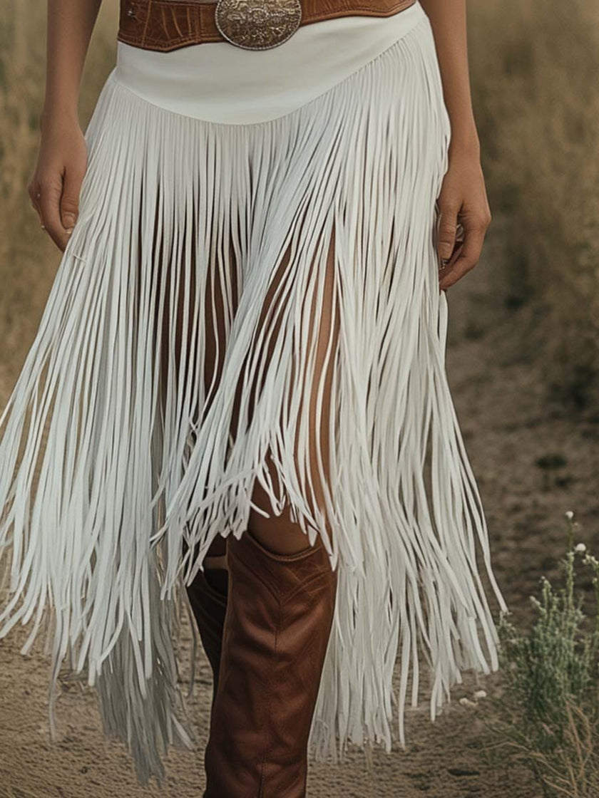 White suede tassel dress by FJØRNA, featuring a casual style with fringed tassels and a relaxed fit, perfect for everyday wear.