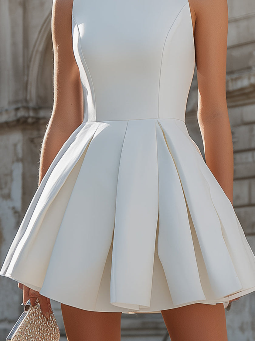 FJØRNA sleeveless structured mini dress with pleated design, fitted bodice, and short skirt, perfect for stylish summer wear.