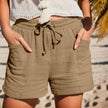 FJØRNA women's lightweight summer shorts with wide-leg fit, drawstring waist, and pockets, perfect for casual warm-weather wear.