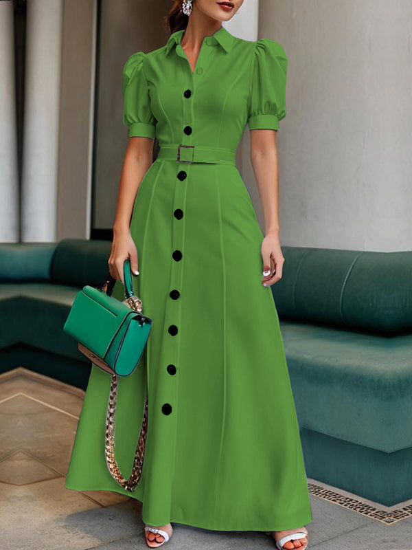 White FJØRNA maxi dress with puff short sleeves, belted waist, button details, and lapel collar.