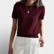 Women's FJØRNA knit top in wool blend, classic fit, with long sleeves and a cozy, stylish look.
