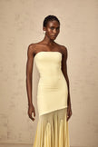 FJØRNA Josiane yellow off-shoulder sheer tulle maxi dress with flowy silhouette and elegant design.