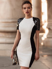 FJØRNA sculpted contrast panel short sleeve evening dress for women, featuring elegant design and fitted silhouette.