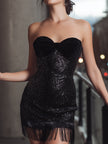 Black velvet bow sequin fringe mini dress by FJØRNA, featuring black sequins, a bow detail, and a stylish short dress silhouette.