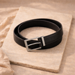 Vegan adjustable unisex ring belt by FJØRNA featuring a sleek, minimalist design and durable vegan leather material.