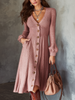 FJØRNA retro V-neck mohair knitted midi dress with button details and pockets, showcasing a stylish and cozy design.