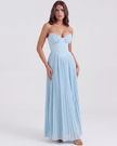 FJØRNA women's strapless pleated maxi dress with corset bodice, featuring a flowing skirt and elegant topaz-colored fabric.