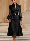 FJØRNA stylish denim dress with organza sleeve panels, showcasing a chic design and elegant fabric details.