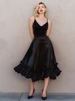 FJØRNA satin ruffled midi dress with spaghetti straps, featuring a flowy, elegant design and delicate ruffle details.