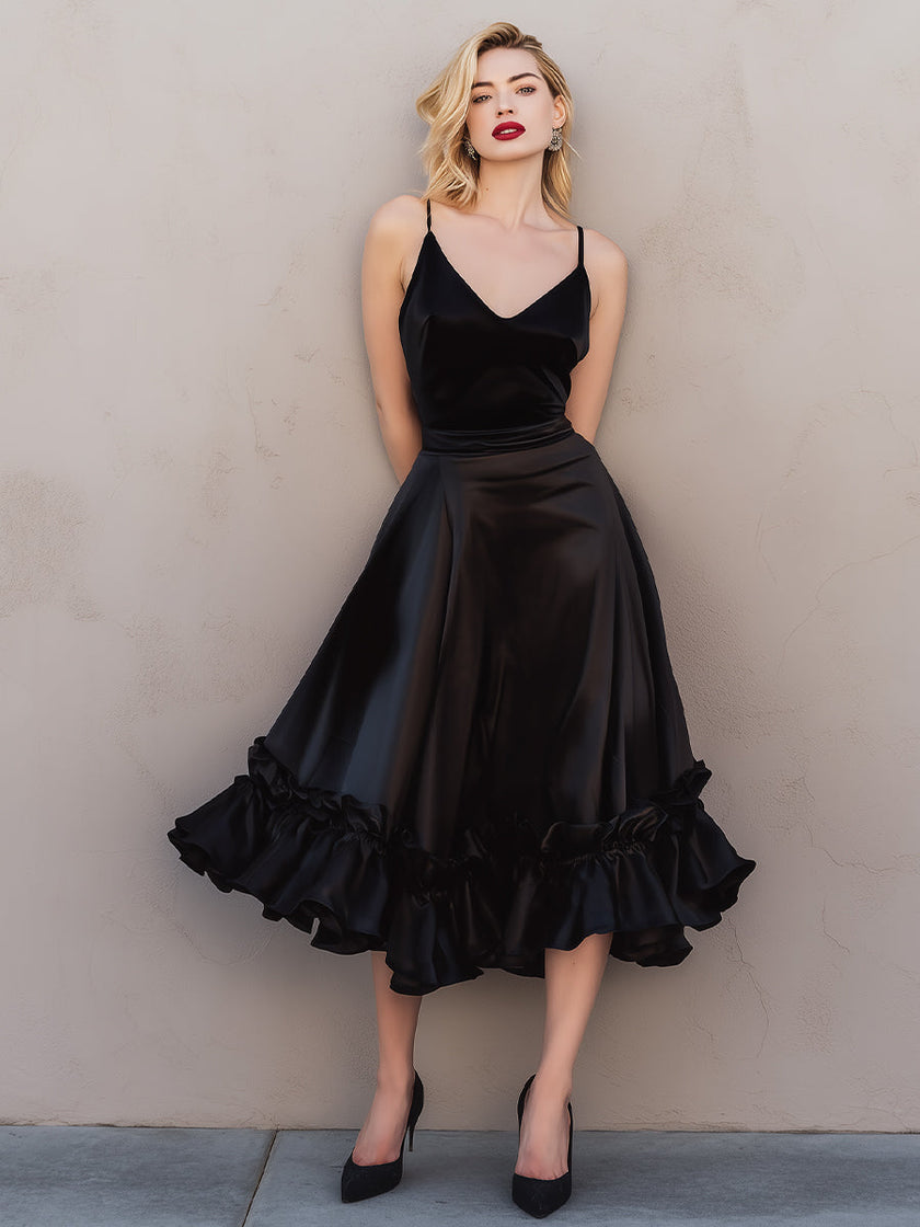 FJØRNA satin ruffled midi dress with spaghetti straps, featuring a flowy, elegant design and delicate ruffle details.