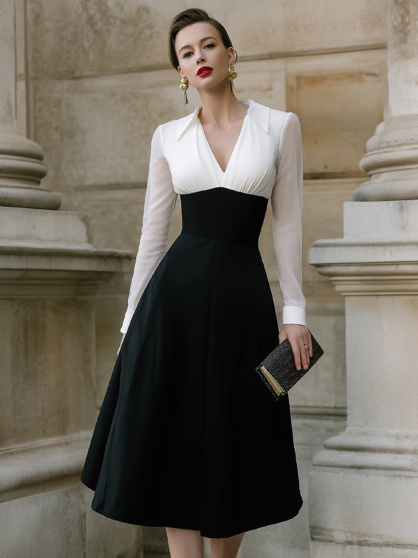 FJØRNA contrast bodice A-line midi dress with sheer sleeves, stylish and elegant for women, displayed on a hanger.