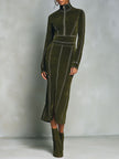 Olive green high neck zip-up midi dress by FJØRNA featuring contrast stitching and long sleeves, displayed on a hanger.