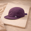Men's FJØRNA hat featuring a classic cap design with a curved brim and adjustable strap, made of durable fabric.