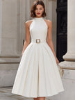 Ivory FJØRNA halter neck pleated midi dress for women, featuring a flowing white midi dress with pleated details and sleeveless design.