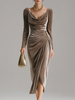 FJØRNA velvet midi dress shown in elegant evening style, featuring a fitted silhouette and soft fabric for formal occasions.