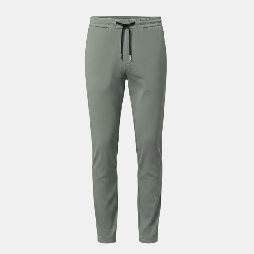 Men's FJØRNA trousers, stylish and comfortable pants with a modern fit, shown in a versatile color.