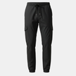 Men's FJØRNA cargo trousers with drawstring, relaxed fit, and multiple pockets, shown in a casual stance.