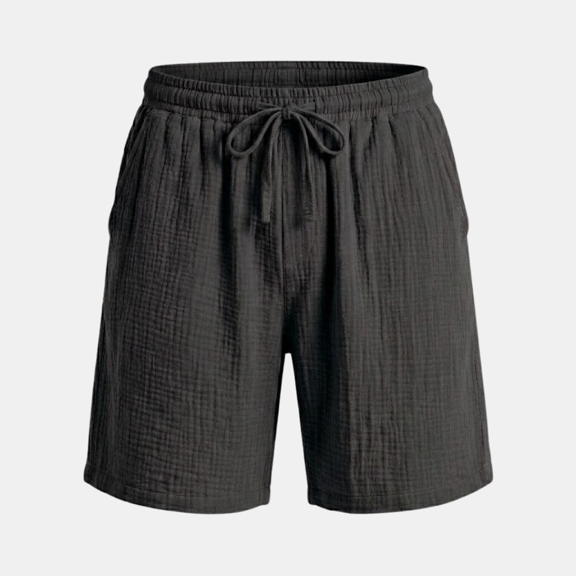 Men's relaxed fit shorts by FJØRNA with drawstring waist, casual style, and lightweight fabric, suitable for summer or leisure wear.