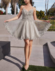 Mint green tulle cocktail dress for women by FJØRNA, featuring a fitted bodice and flowing skirt, perfect for special occasions.