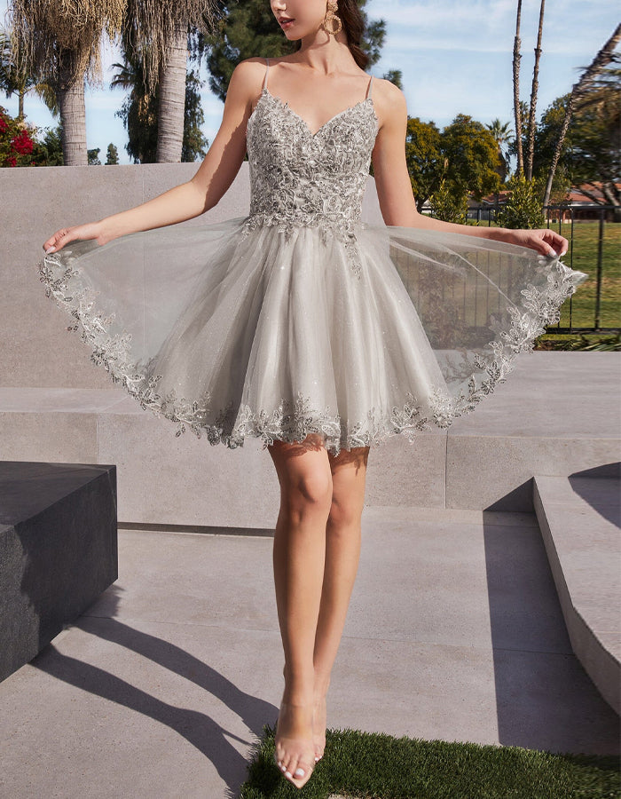 Mint green tulle cocktail dress for women by FJØRNA, featuring a fitted bodice and flowing skirt, perfect for special occasions.