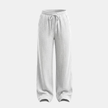 Women’s FJØRNA cotton wide-leg trousers, casual lightweight pants with relaxed fit and comfortable, breathable fabric.