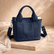 FJØRNA canvas tote bag for women with sturdy handles and minimalist design, ideal for everyday use and carrying essentials.