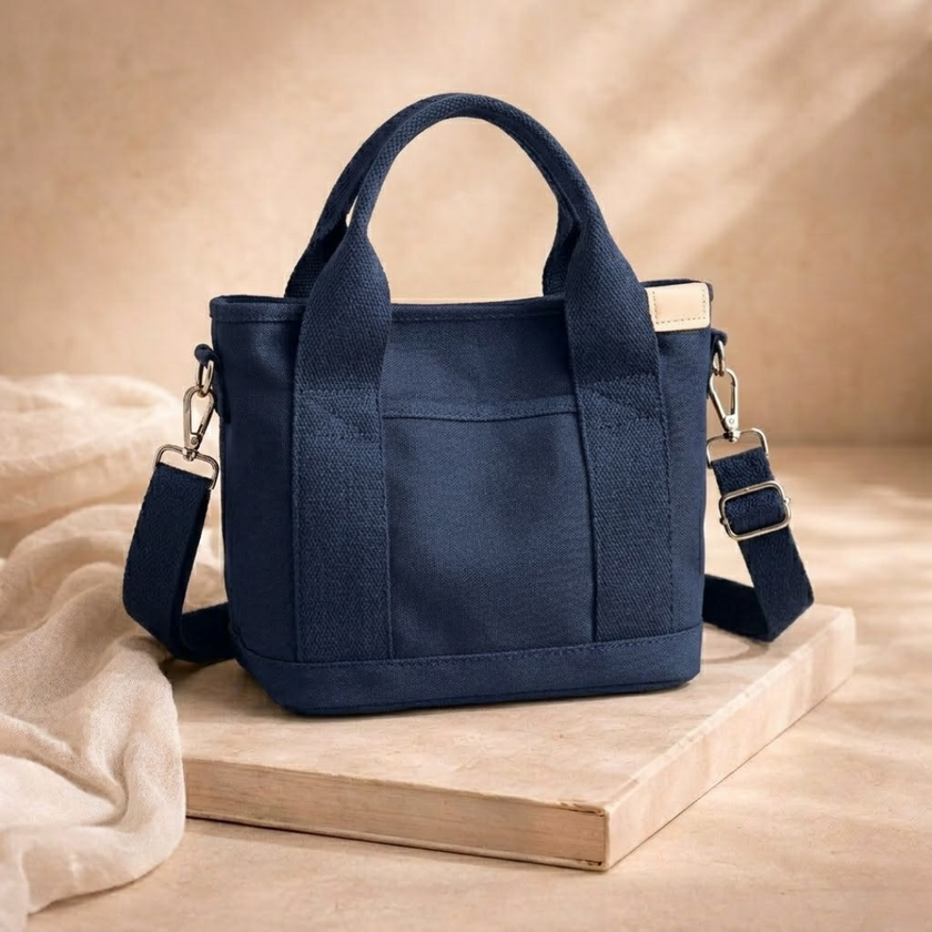 FJØRNA canvas tote bag for women with sturdy handles and minimalist design, ideal for everyday use and carrying essentials.