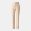 FJØRNA women's straight leg trousers, stylish pants with a tailored fit, shown in a neutral fabric on a model.