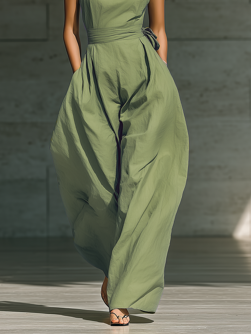 Cotton-linen one-shoulder jumpsuit for women with tie waist and wide-leg pants by FJØRNA, shown in a stylish, relaxed fit.