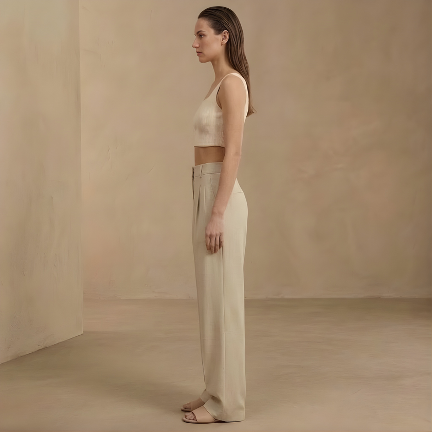 FJØRNA women's high waist wide leg pleated trousers, stylish and comfortable pants with a relaxed fit and modern design.
