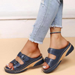 FJØRNA orthopedic comfort fit slide sandals with perforated open toe design, showcasing cushioned footbed and open-toe style.