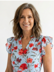 FJØRNA women's floral tiered summer midi dress featuring a flowy design and vibrant flower print, perfect for warm weather.