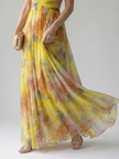 FJØRNA women's sleeveless summer maxi dress with flowy fabric and floral pattern, perfect for warm-weather styling.