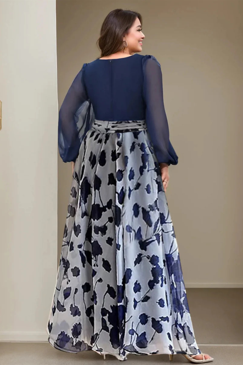 FJØRNA floral print V-neck balloon sleeve maxi wedding guest dress with elegant silhouette and vibrant floral pattern.