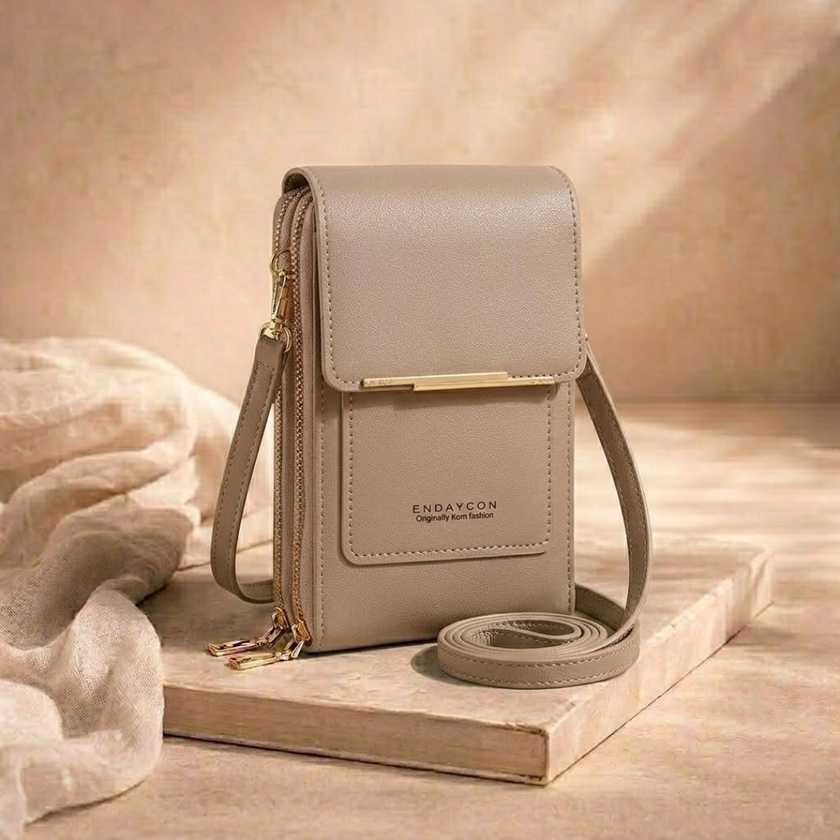 FJØRNA women's anti-theft crossbody travel bag with secure zipper and adjustable strap, designed for convenient travel security.