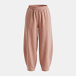 FJØRNA women's cotton linen wide-leg trousers with relaxed fit, showing the flowy, lightweight fabric and high-rise design.
