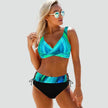 FJØRNA women's bikini set with wrap top, featuring a stylish two-piece swimwear design and adjustable straps on the top.