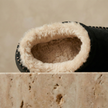 FJØRNA men's slip-on slippers with soft fabric upper and cushioned soles, designed for indoor comfort and casual wear.