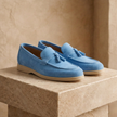 FJØRNA men's suede shoes featuring a sleek design with laces and a smooth brown finish.